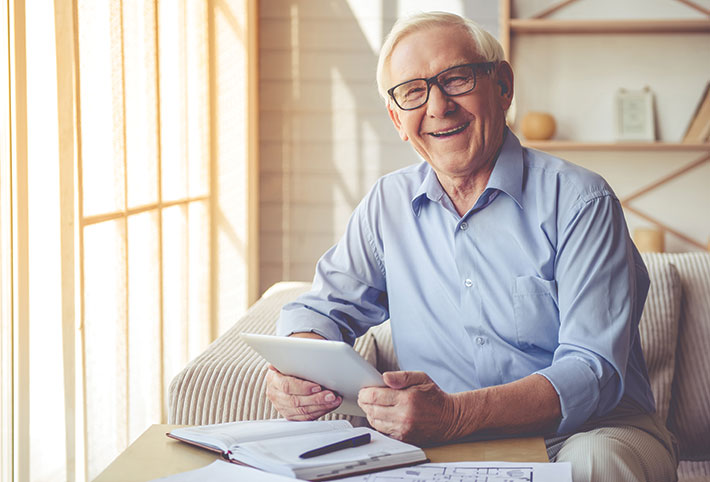 Photo of a man smiling. 
